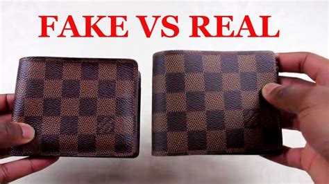 how to tell if louis vuitton wallet is fake|louis vuitton wallet authenticity code.